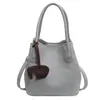 Bolso Pequeño Elegante de Gama Alta para Mujer, Nuevo Bolso Cruzado Versátil de Moda Verano 2026, Bolso Cubo de Mano Súper Popular