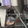 Los fabricantes suministran máquinas envasadoras de bolsas prehechas para verduras, máquinas llenadoras de salsas tipo cubo de cadena y máquinas envasadoras de bolsas