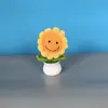 Planta em vaso tecida à mão produto acabado rosto sorridente girassol coelho girassol pequena planta em vaso decoração de carro barraca de atacado
