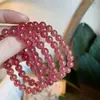 Espíritu joven fábrica de cristal de fresa venta directa damas ruso paloma roja 7A natural cristal de fresa pulsera pulsera