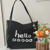 2025 Nova Bolsa de Lona Versátil Estilo Coreano com Letras de Ombro Único Casual Grande Capacidade para Estudante, Trabalho, Compras