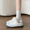 Zapatillas de entrenamiento alemanas de alta moda populares para mujer, nuevas zapatillas de otoño 2026, zapatos casuales versátiles de nicho con suela gruesa