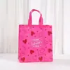 Bolsa de Mano de Tela No Tejida Impresa Más Vendida de Amazon Rosa Bolsa para Empaquetar Regalo del Día de San Valentín Bolsa Plegable de Almacenamiento