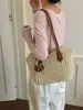 Bolso de paja con borlas transfronterizo, nuevo bolso tejido de paja, bolso de playa para vacaciones, bolso de hombro versátil, bolso tote de verano para el día a día