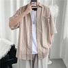 Camisa de manga corta de verano 2024, nueva camisa de trabajo a rayas para hombre, camisa holgada estilo Hong Kong para uso exterior, camisa de abrigo para hombre