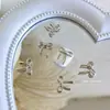 Acessórios de liga para nail art personalizados, laços de macaron, decorações metálicas de unhas vestíveis DIY, atacado em grandes quantidades