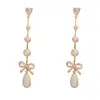 Moda Coreana y Japonesa Dulces Versátiles Zirconia Lazo Perla Borla Pendientes Elegantes Lujo Ligero Pendientes Largos para Mujer