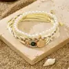 Pulsera de Cordón Trenzado Estilo Vacaciones de Verano Nuevo Europeo y Americano Pulsera de Playa Estrella de Mar Concha Perla Pulsera Trenzada de Cordón Ajustable
