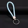 Joyería Tejida Creativa Llavero de Cuerda de Cuero Colgante para Coche Llavero de Cuerda de PU para Pareja Pequeño Regalo Fabricante Bolsa