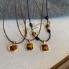 Collar de cuerda de cuero tejido con piedra de ojo de tigre para mujer, otoño e invierno 2024, nueva cadena de suéter popular, estilo retro, temperamento, accesorios que combinan con todo