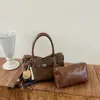 Bolso modelo nuevo 2026 transfronterizo, bolso de mano simple estilo coreano, bolso tipo cubo de moda de gran capacidad, bolso cruzado casual para el día a día