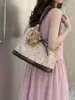 Bolsa Grande de Bolinhas Transfronteiriça para Mulheres 2026 Novo Modelo Versátil para o Dia a Dia Bolsa de Ombro ou Axila Bolsa de Mão Casual Bolsa Tote