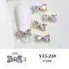 Venta al por mayor Joyería de Circonita para Manicura Pajarita Accesorios para la Punta del Dedo Lujo Ligero Oro y Plata Diamante Decoraciones de Uñas Portátiles