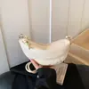 Bolsa feminina super popular transfronteiriça 2026 nova bolsa nicho de axila formato bolinho com um design de ponta, estiloso e versátil, adequada para usar no ombro ou transversal