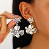 Aretes largos retro de pétalos grandes estilo europeo y americano transfronterizo, personalidad, celebridad de internet, mate, exagerados, geométricos para mujer, al por mayor