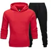 Conjunto de sudadera de color liso de talla grande para hombre y mujer, 220 g de tela, fabricante mayorista, conjunto holgado de talla grande de marca de moda para parejas
