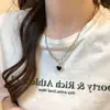 Collar de Parches de Corazón Negro Dulce y Fresco para Mujer Estilo INS Lujo Ligero Sentido de Diseño de Alta Gama Personalidad de Nicho Cadena de Clavícula a la Moda