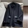 2026 Nuevo Estilo Elegante Hebilla Decorativa de Cuero Cuello Alto Corto Hecho a Mano Lana Doble Cara Abrigo para Mujeres Venta al por Mayor B2ED9813
