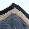 Pantalones extra grandes para mujeres de mediana edad y mayores, pantalones de estilo western para madre, moda de alta gama, pantalones rectos, nuevos para otoño e invierno, pantalones cálidos con temperamento