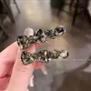 Presilha de cabelo de alta qualidade estilo coreano com laço e strass, um novo design delicado e luxuoso para mulheres, perfeita para prender franjas laterais e fios soltos