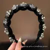 2026 Nueva Flor de Cristal Lujo Ligero Esponjoso Temperamento Peine Dentado Antideslizante Sentido del Diseño Diadema Accesorios para el Cabello Tocado