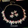 Set de Collar y Aretes de Flor de Pedrería Perla Retro Europeo y Americano Lujo Ligero Gama Alta Exquisito Accesorios de Trabajo Pesado Versátil