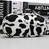 Estuche de Lápices Nuevo Diseño Cuadros Transfronterizo, Bolsa de Maquillaje Portátil, Estuche de Lápices Estudiante Gran Capacidad Estampado de Vaca