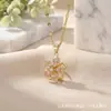 Pendente Giratório de Design Criativo Flor Bauhinia Zircônia Rosa Cobre Colar Feminino Super Brilhante Estilo Palácio Francês Flor de Cinco Pétalas