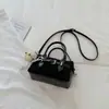 Bolso de mano casual de moda nuevo para principios de otoño de 2026, Boston de alta estética para el trabajo, bolso de hombro y cruzado