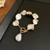 Pulsera trenzada de perlas con circonita rosa Manta Rose, Lujo ligero, Gama alta, Pulsera de moda y exquisita, Joyería de mano simple y versátil para mujer