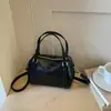 Bolso tipo maletín grande de moda estilo coreano para mujer, nuevo y moderno de verano 2026, bolso de hombro de alta gama para ir al trabajo, bolso de bolos