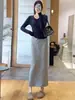 Falda casual para mujer estilo coreano, nuevo estilo deportivo de otoño, que cubre la cadera, corte recto holgado línea A adelgazante con abertura, falda ajustada