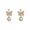 Brincos de Zircônia Borboleta Pérola Moda Versátil Exquisito de Nicho, Elegante Leve Luxo Doce Simples Super Fada Brincos Atacado