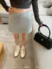 Trece LíneasKAPOK¡Novedades de Otoño! Falda versátil de línea A con cordón de cintura alta informal estilo coreano 26481