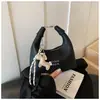 Bolso pequeño texturizado para mujer, nuevo modelo primavera 2026, bolso cuadrado pequeño de alta costura de nicho, bolso de hombro y cruzado