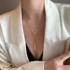 Nuevo collar sencillo con colgante largo en forma de V elegante, cadena para la clavícula de personalidad femenina, todo-partido, cadena para suéter con sentido de diseño de nicho