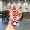 Llavero de Pata de Gato de Cristal Colgante para Bolso Correa para Teléfono de Perlas y Cuentas Encantos de Pata Kawaii Lindos Accesorios Regalos para Mujeres