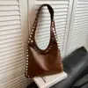 Comércio Exterior Personalizado Rebite Alta Qualidade Bolsa Feminina 2026 Nova Tendência Moda Retrô Casual Bolsa de Ombro Bolsa Tote
