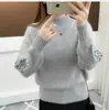 Suéter feminino de malha com gola alta e mangas compridas para outono e inverno, blusa de tricô feminina estilo coreano bordada com pequenas flores