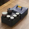 Juego de té de viaje traje pequeño cerámica exterior hogar Kung Fu una tetera cuatro tazas tetera taza portátil regalo creativo