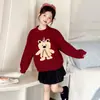 Ropa de punto versátil estilo coreano para otoño e invierno de niños, top rojo elegante para niños mayores con ambiente navideño y de Año Nuevo para bebés