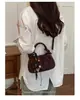 Exquisito bolso retro de gamuza de nicho para mujer, nuevo modelo 2026, bolso cruzado casual versátil, bolso de mano pequeño súper popular
