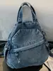 Bolso de Pecho Simple Estilo Nuevo 2026 Mochila Versátil de Mezclilla para Mujer para Viajes de Negocios Ligera Mochila para Estudiantes