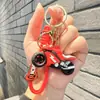 Llavero de motocicleta de rayo de dibujos animados creativos, colgante lindo de estudiante, llavero de coche, pequeño regalo tridimensional para estudiante