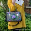 Estilo étnico bordado portátil bandolera doble uso bolsa tambor lona bordada bolsa floral viaje hombro portátil bolsa para mujer