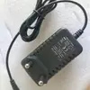 Adaptador de corriente al por mayor de fábrica 2A regulaciones europeas regulaciones americanas regulaciones británicas adaptador de corriente de carga para lámpara de uñas