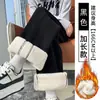 Pantalones nuevos para mujer Otoño/Invierno 2026, corte holgado versátil, adelgazantes, elegantes, casuales, con abertura, adecuados para ir al trabajo, forrados de polar