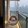Cesta colgante para el hogar Silla de ratán Silla colgante para balcón interior Silla mecedora Silla cuna de celebridad de internet Hamaca para persona perezosa en el patio Silla mecedora exterior