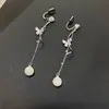 Pendientes de Mariposa con Borla Larga Ojo de Gato Hada Dulces para Mujer Pinzas para Orejas en Espiral sin Agujero en las Orejas Lujo Accesible Pendientes Elegantes