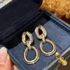 Brincos Anel de Mobius Geométrico Cao Shi Simples e Luxuosos Brincos de Zircônia Brilhante Brincos da Moda para o Deslocamento Diário